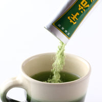Ippodo Tea Uji-Shimizu green sweetened matcha powder to go stick travel pack sprinkled into espresso cup of matcha tea