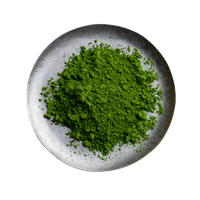Stone-ground matcha powder on a ceramic plate