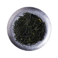Loose-leaf sencha on a ceramic plate