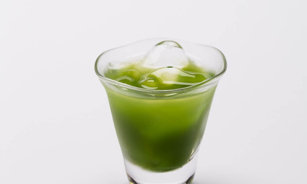 Picture of uji-shimizu sweetened matcha powdered in a glass with ice